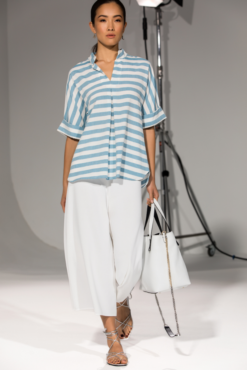 Look casual pantalones blancos Naulover